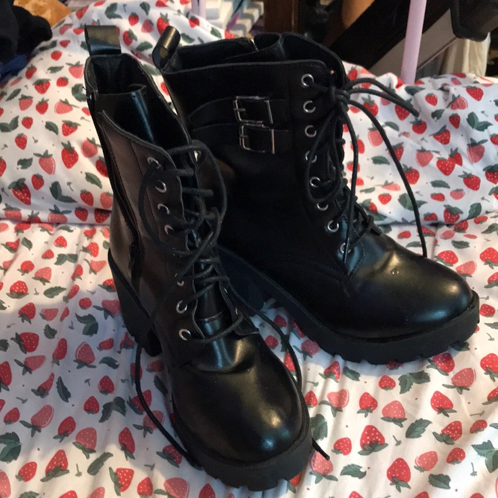 Black heeled combat boots